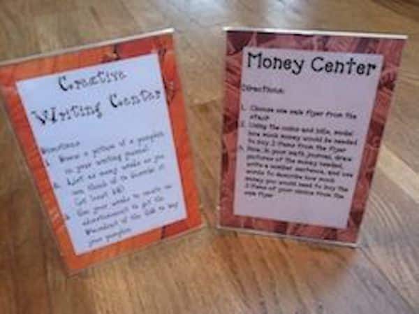 How about a fun and easy way to display your classroom center signs? And I bet you might even have all the supplies you need already on hand! Score!