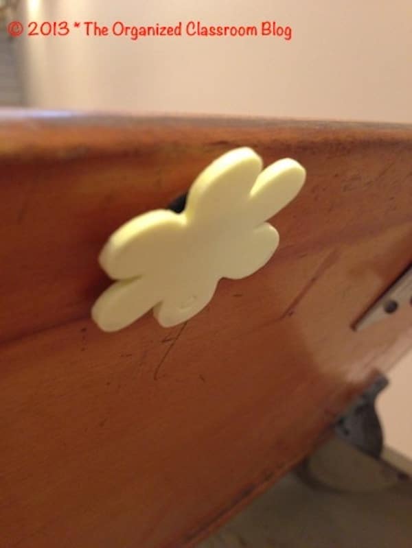 Here is a quickie tip for those of you who have student desks with lids. It drives me bonkers when they slam them shut and it makes a huge clanging noise.