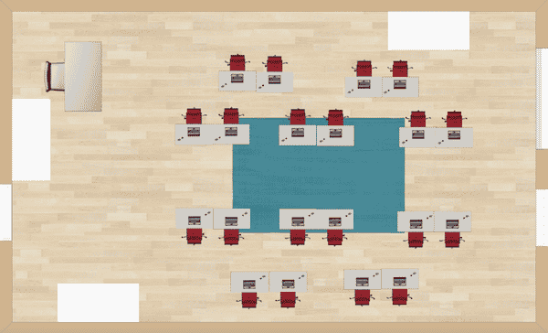 This desk arrangement is more like a competitive arena. The students are able to work in a discussion format and are able to see one another, while there is still a team concept from viewing the alternating sides of the room.