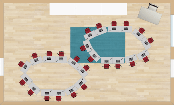 Not perfect circles, but rather more egg-like, these two small circles of desks are good for students moving into groups. You could use this seating arrangement to your advantage by having students get into different groups throughout the lesson or day and switch seats. It certainly would keep the students awake!