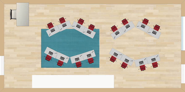 Shaped like a pair of glasses, this seating arrangements veers from the traditional straight lines you often see in the majority of classrooms. This seating arrangement allows for intimate book discussions or thought-provoking math revelations.