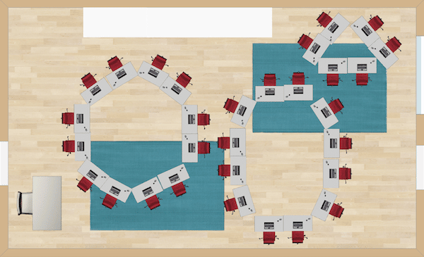 Student learning activities can be completed in small groups with this classroom desk arrangement. Students are facing one another to discuss books in literature circles or to debate theory.