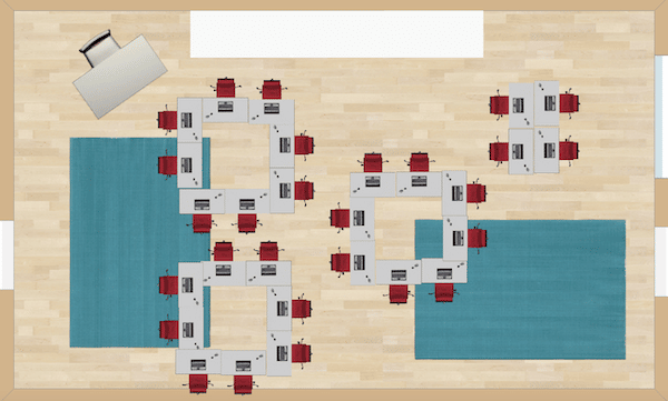 This classroom desk arrangement consists of three small groups that form an open box, along with one small group of four desks arranged in a box formation. This type of seating would be ideal for small group work.